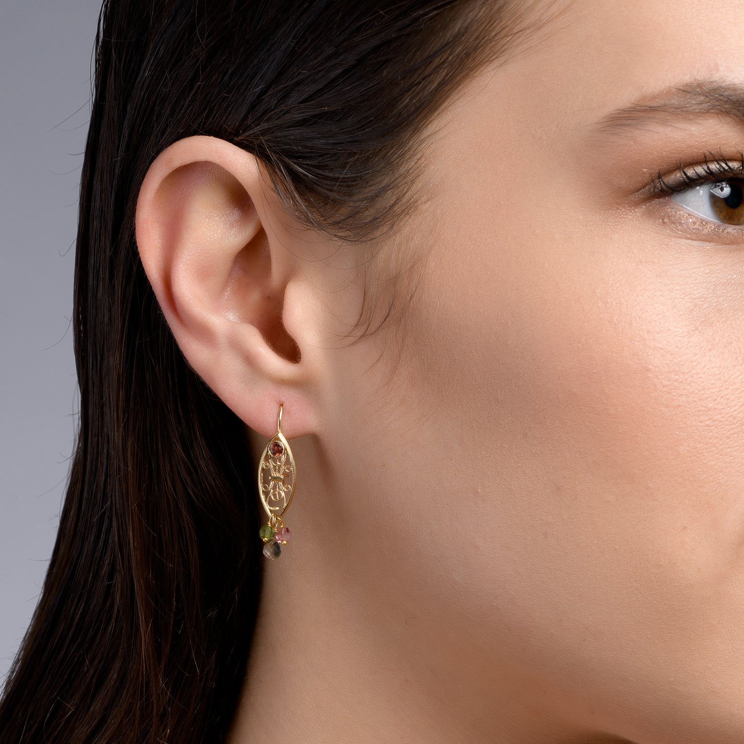 Marrakesh Ruby and Tourmaline Earrings, shown on a model