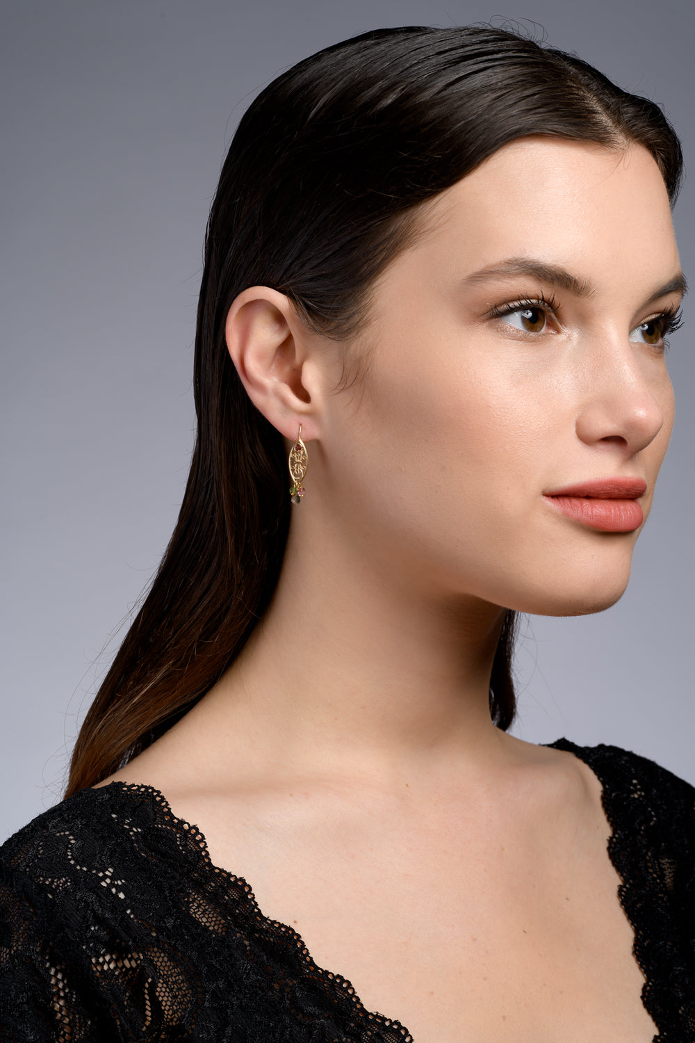 Marrakesh Ruby and Tourmaline Earrings, shown on a model